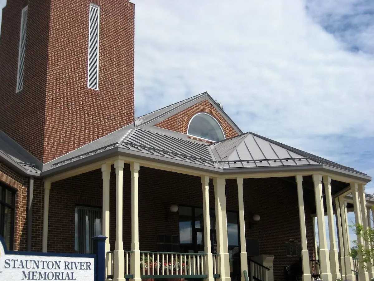 Skilled roofing craftsmen working on a residential roof in Allison Hill